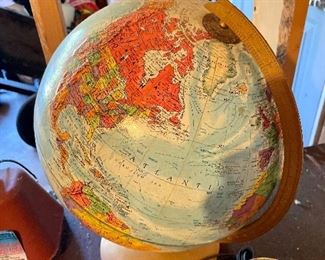 Vintage globe and barometer