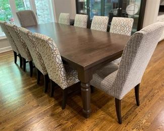 Custom made table 108"x48" (has three leaves) and can adjust to 168" in length, Table was made in Quebec, Canada. Side and Captains chairs are by Fairlane