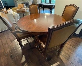 Round table and chairs, has one leaf