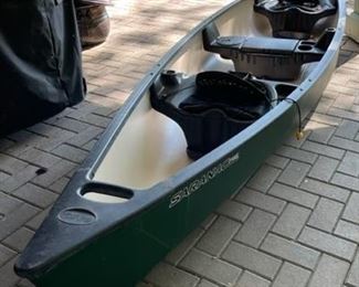 Old Town Saranac canoe with two seats, two storage compartments, includes paddles