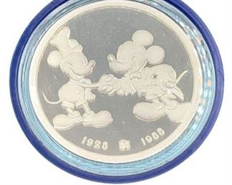 Lot 13
1988 Mickey 60 Years With You 'Exclusive Theme Park' Collectors Coin