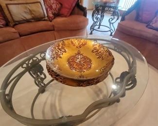 HEAVY GLASSTOP COFFEE TABLE WITH ORNATE METAL BASE