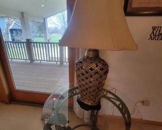 1` OF 3  HEAVY ROUND GLASSTOP TABLES WITH ORNATE METAL BASE