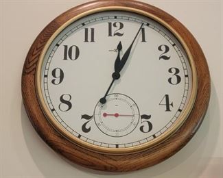 HOWARD MILLER OAK WALL CLOCK