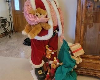 UN MARKED 6 FT SANTA CLAUSE.  ANIMATED MOVEMENT.  HE/S NOT A SINGER