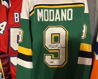 Mike Modano autographed jersey with JSA COA. 