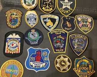 Some of the collection of police patches. 