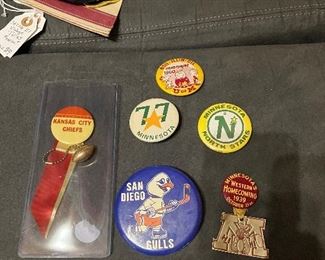 Some of the collectible pins, buttons and patches available. 