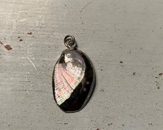 Silver like shell charm. 