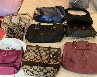 Brand new Coach purses some with tags still attached. 