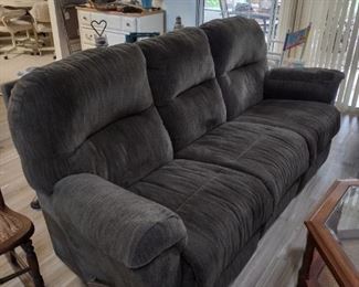 Sage green dual reclining sofa