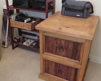 Tripods, cameras, rustic cabinet