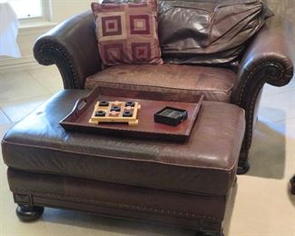 Gabberts Furniture distressed leather chair and ottoman