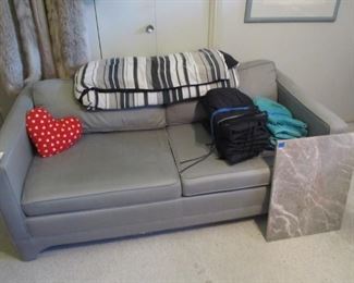 A cute vintage pull-out sofa