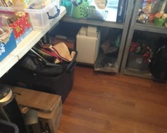 One room full of every kind of item you could possibly need - shelves are full and more! Bottom middle white item is portable sewing machine with accessories!