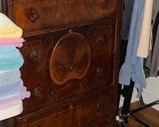 Chest n bedroom with shelves