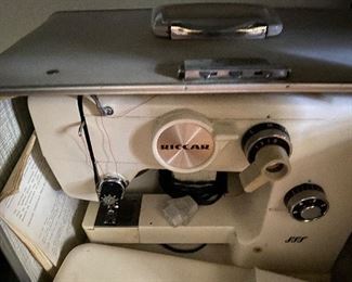 Riccar Sewing Machine with accessories and carrying case
