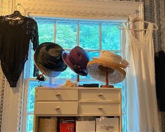 Many vintage hats, antique lace and textiles