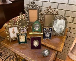 Brass and ornate picture frames