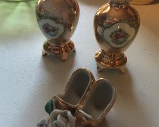 Japanese lustreware mini vases and a tiny pair of shoes.