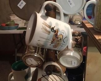 Pottery mugs and a vintage insulates mug by Serv-Ware.