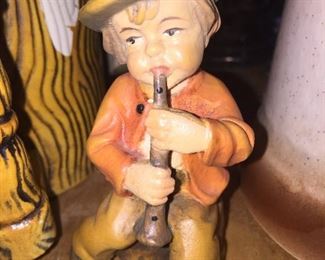 A hand-carved shepherd boy, likely from Germany.
