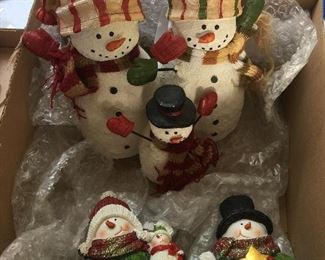 A collection of snow people ready to debut in a new home for the holidays.