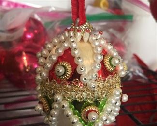 Traditional Christmas colors shine on this ornament loaded with sequins and beads.