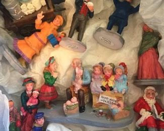 A grouping of mini figures looking to join a new snow village.