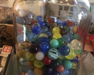 What’s not to love about a jar of marbles? They blend in with most decor from contemporary to old-school.