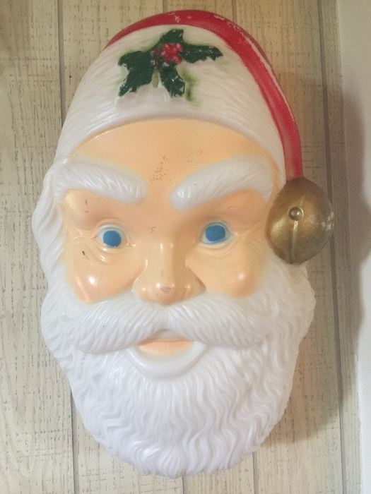 A blow mold of Santa’s face is nearly 2-feet long and ready to greet holiday visitors.