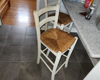 pair woven chairs