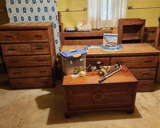 Kirby Furniture, similar to This End Up, solid wood and very heavy. (if considering this, bring loading/moving help)