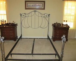 Queen size iron bed frame and pair of Lexington night stands.