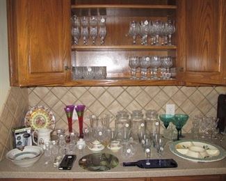 Kitchen is packed full of beautiful glassware.