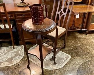 Antique Round Table with Engraved Edging and a Bottom Shelf