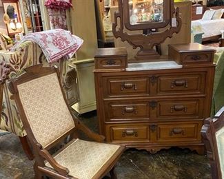 (Pat. Date 1876) Antique Sliding Wooden Rocker and an Antique Eastlake Dresser with Top Glove Drawers, Marble Top, and Ornately Carved Mirror