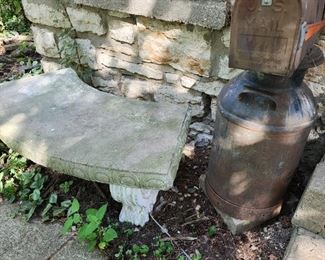Concrete bench and milk can mailbox