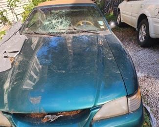 1996 Ford  Mustang Soft top, needs windshield and tuneup as well as a few cosmetic issues. Not running, won't turn completely over.no title
