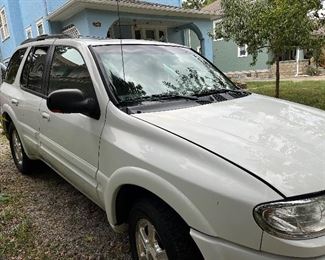 Running 2003 Oldsmobile Bravada 271,000 miles. All leather with sunroof, power locks and windows.Pretty clean inside and out. Need motor replaced on back drivers side window and will need breaks soon. Service light is on.