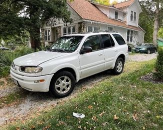 Running 2003 Oldsmobile Bravada 271,000 miles. All leather with sunroof, power locks and windows.Pretty clean inside and out. Need motor replaced on back drivers side window and will need breaks soon. Service light is on.