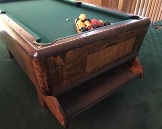 Love this bar pool table.  Unusual ball return.  Accessories included.