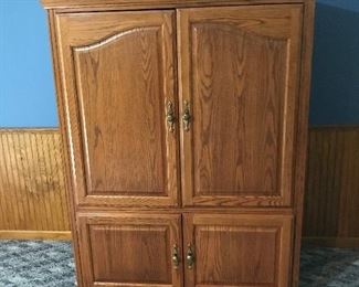 Oak Media cabinet.  Also as two book shelves that match.  Are being sold separately or together