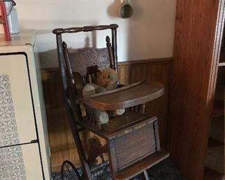 Love this fold down oak Victorian Highchair.  NOtice the wheels and tray - perfect condition.