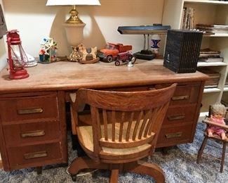 Love this Oak Desk with brass handles.  Another great swivel desk chair