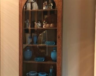 Love this Oak Curio Wall Cabinet with beautiful treasurers.