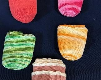 Glass Cozies - someone spent a lot of time knitting.