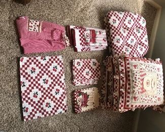 Love this set of cushions, towels, potholder, apron, placemats - cerry pattern. So cheerful.