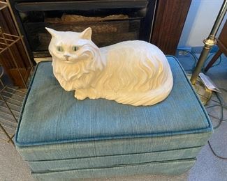 Hammock and ceramic cat.