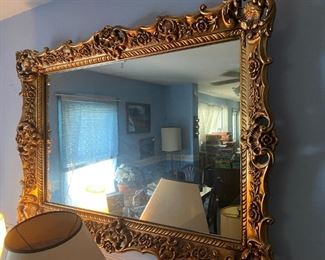 Gilded mirror.